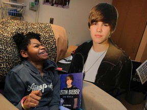 Shown in this file photo, Tanisha, 14, is a huge fan of Justin Bieber and staff at Windsor Regional Hospital's Met Campus are hoping the mega pop star could pay a visit.  Severely disabled since birth and a ward of the Children's Aid Society, Tanisha has a life-sized cutout of Bieber and plenty of Bieber material in her room at Met, November 12, 2012.  (NICK BRANCACCIO/The Windsor Star)