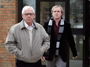 In this file photo, Justin Brodie Timms-Fryer, right, leaves Amherstburg Police Station with his grandfather Bill Fryer on December 13 , 2011.  (NICK BRANCACCIO/The Windsor Star)