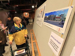 Residents from the University Avenue West area check out plans for a cultural hub development project Tuesday, Nov. 6, 2012, at the former Junction restaurant in Windsor, Ont.  (DAN JANISSE/The Windsor Star)