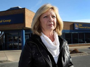 Debra Doe is photographed in front of the Royal Bank in Tecumseh on November 27, 2012. Doe says she was told local banks are not putting up Christmas decorations this year. (TYLER BROWNBRIDGE / The Windsor Star)