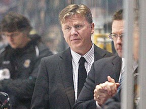 Former Spitfire Todd Gill, centre, is the coach of the Kingston Frontenacs. (DAX MELMER/The Windsor Star)