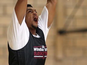 Express forward Kevin Loiselle dunks the ball at the John Atkinson Centre last month. (NICK BRANCACCIO/The Windsor Star)