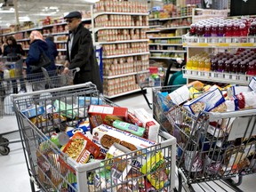 Pay attention to what you put in your grocery cart. Impulse buying doesn't just make your bill skyrocket. It packs on the pounds. Daniel Acker/Bloomberg News