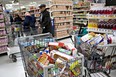 Pay attention to what you put in your grocery cart. Impulse buying doesn't just make your bill skyrocket. It packs on the pounds. Daniel Acker/Bloomberg News