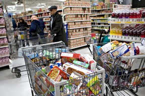 Pay attention to what you put in your grocery cart. Impulse buying doesn't just make your bill skyrocket. It packs on the pounds. Daniel Acker/Bloomberg News