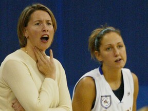 University of Windsor Lancers coach Georgia Risnita, left, shouts instructions in front of Cheri Mulcaster at the St. Denis Centre. (Star file photo)