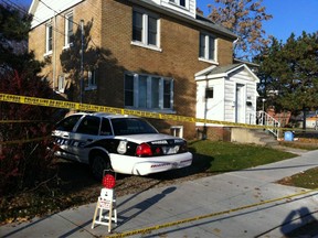 A Windsor police cruiser sits outside of a residence in the 600 block of Felix Avenue where police say a shooting may have occurred on Thursday. (TREVOR WILHELM/The Windsor Star)