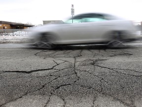 The condition of the roadway on Norfolk Ave in Windsor, in Feb. 14, 2011.  (DAN JANISSE/The Windsor Star)