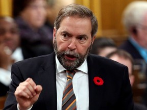 NDP Leader Tom Mulcair stands in the House of Commons during Question Period in Ottawa, Wednesday November 7,2012. THE CANADIAN PRESS/Fred Chartrand