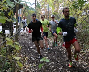 St. Clair's Andrew deGroot, left, training at Ojibway Park, won the CCAA cross-country championship Saturday in Quebec. (NICK BRANCACCIO/The Windsor Star)