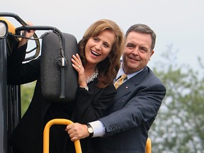 Former Windsor West MPP Sandra Pupatello (L) and Windsor-Tecumseh MPP Dwight Duncan (R) pose for a photo at a press conference in Windsor, Ont. in August 2011. (Tyler Brownbridge / The Windsor Star)