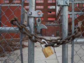 The empty and decrepit former Grace Hospital site is padlocked from the public.