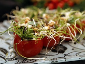 A holiday feast is laid out by Cindy Piccolo. Check out more photos below of how to dress up a food table for the holidays. (TYLER BROWNBRIDGE / The Windsor Star)