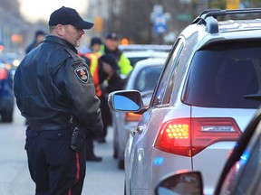 In this file photo, officers with the Windsor Police Service, Lasalle Police and Ontario Provincial Police along with the local MADD chapter kicked off an awareness campaign on Nov. 1, 2012, in downtown Windsor. They were reminding people not to drink and drive.
