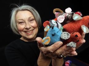 Renate Tunney shows off her catnip mice which will be part of a craft sale this weekend at the Riverside Library. (TYLER BROWNBRIDGE / The Windsor Star)