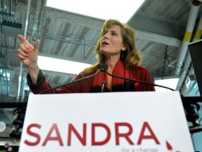 Former Ont. cabinet minister Sandra Pupatello gestures during a news conference in Toronto on Thursday November 8, 2012. Pupatello officially launched her bid for the Ontario Liberal leadership. THE CANADIAN PRESS/Nathan Denette