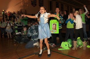 The crowd reacts to the announcement that Lasalle's Danielle Wade is the winner of the Over the Rainbow singing competition. Approximately 400 people assembled in the Sandwich Secondary School gym to watch the final episode. Wade is a graduate of the school.  (DAN JANISSE/The Windsor Star
