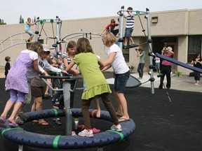 Kids play on in Canada's first LED playground In Edmonton on August 25/09. (Postmedia News files)