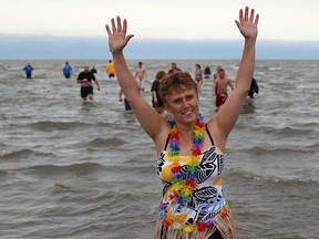 Sue Heath, from Belle River, dressed in some fun Hawaiian attire while participating in the 3rd annual Polar Splash event at Belle River West Beach, Sunday, Nov. 20, 2011. (DAX MELMER/The Windsor Star)