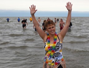 Sue Heath, from Belle River, dressed in some fun Hawaiian attire while participating in the 3rd annual Polar Splash event at Belle River West Beach, Sunday, Nov. 20, 2011. (DAX MELMER/The Windsor Star)