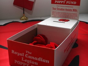 A Remembrance Day poppy donation box is shown at the Royal Canadian Legion branch in Leamington, Ont. on Nov. 1, 2012. (Nick Brancaccio / The Windsor Star)