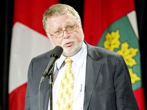 Ted McMeekin, Minister Of Agriculture, Food And Rural Affairs speaks to media following a swearing-in ceremony for Cabinet Ministers at Queens Park in Toronto, October 20, 2011.   (Tyler Anderson/National Post)