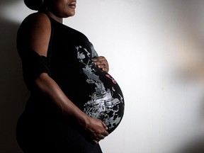 In this file photo, Claire Dickenson is photographed in her home in Windsor on Friday, November 30, 2012. Dickenson is concerned about not having health care coverage after her refugee claim was denied. (TYLER BROWNBRIDGE / The Windsor Star)