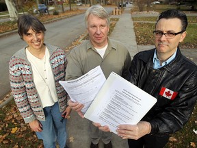 Parma Yarkin, Gary Langill and Bob Nagy (left to right) hold copies of the failing grade report cards they plan to present to their city councillor Ron Jones at the next ward meeting in WIndsor on Tuesday, November 20, 2012.                 (TYLER BROWNBRIDGE / The Windsor Star)