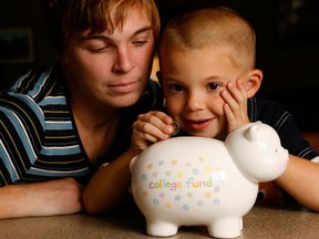 File photo of a family trying to save money. (Postmedia file photo)