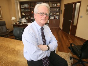 Ross Paul, former  President of the University of Windsor poses in his office in 2005.(The Windsor Star-Dan Janisse)
