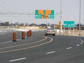 A motorist approaches the Windsor-Essex Parkway's new roundabout at Highway 3 and Howard Avenue. It's the first two-lane roundabout in the area. Photographed Nov. 5, 2012. (Tyler Brownbridge / The Windsor Star)