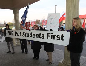 Members of various teachers unions protest Thursday, Nov. 8, 2012, in Windsor, Ont. where Sandra Pupatello announced her candidacy for the Ontario Liberal leadership race. (DAN JANISSE/The Windsor Star)