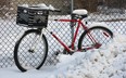 A snow covered bike sits along a fence in Windsor, ON. Dec. 13, 2010. after the region's first real taste of winter. (DAN JANISSE/The Windsor Star)