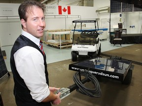Files: Sean Moore, CEO of Unconquered Sun Solar Technologies on Mar. 21, 2012, with a self contained solar powered pump. (DAN JANISSE/The Windsor Star).