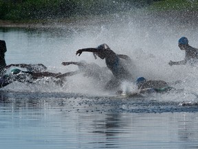 Ironman triathlons begin with a 2.4-mile swim, followed by a 112-mile bike ride and 26.2-mile run. (RICHARD MARJAN / Postmedia News files)