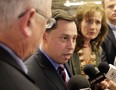 Brad Duguid, centre, Ontario Minister of Energy in this file photo, speaks at press conference announcing the  $12 million  investment by United Solar in a manufacturing facility in LaSalle, (JASON KRYK/ The Windsor Star)