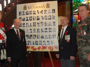 Veterans Terry Hall, from left, David Hollingsworth, Earl McWhinney and George Sesto are four of five remaining vets, all members of Christ Church (Anglican) Amherstburg, pictured on a newly created poster of 57 veterans, all past and present parishioners, Friday, November 09, 2012 at Christ Church. (The Windsor Star- Julie Kotsis)  Cy Curtis, a Second World War veteran, was unable to attend the unveiling. The five veterans are the only remaining from the 59 depicted on the poster.