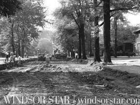 Aug.2/1957-Big construction machinery has moved onto Victoria Ave. which is getting a new and wider surface. The road is being widened to 38 feet from 29 feet between park and Wyandotte. (The Windsor Star-FILE)