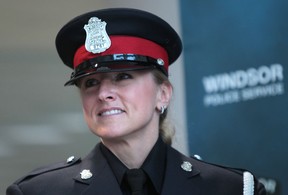 Windsor Police constable Susan McCormick is all smiles after she was handed a Windsor Police Services Board commendation on February 23, 2012 at Windsor Police headquarters. Const. McCormick was honoured for her efforts when she jumped into the Detroit River and saved a man in Nov. 2011. (JASON KRYK/ The Windsor Star)