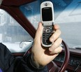 Driving and talking on cellphone. (Postmedia News files)