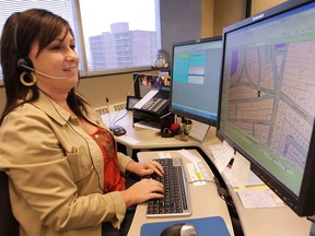 Lori Martin is a 311 operator for the City of Windsor, at the 400 building. (DAN JANISSE/The Windsor Star)