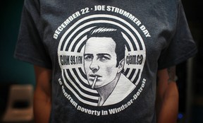 Murad Erzinclioglu, music director at CJAM 99.1 FM, wears a Joe Strummer Day T-shirt while working his shift at the 24-hour Joe Strummer marathon to combat poverty in Windsor and Detroit, at the CJAM 99.1 FM radio station at the University of Windsor, Saturday, Dec. 22, 2012.  (DAX MELMER/The Windsor Star)