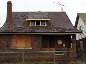 A boarded up house on the 600 block of Indian Road in West Windsor is pictured Sunday, Dec. 16, 2012. City council is expected Monday to defer a new application from the Ambassador Bridge to demolish properties it owns in Sandwich
 (DAX MELMER/The Windsor Star)