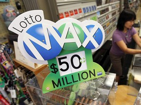 A sign advertises the $50-million Lotto MAX jackpot  this past summer. The jackpot has again reached $50 million, with no winner Friday, Oct. 25, 2013. (Tyler Brownbridge / The Windsor Star)