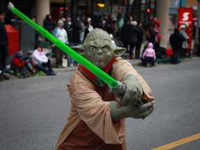 Yoda makes an appearance at the Holiday Parade on Ouellette Avenue in downtown Windsor, Saturday, Dec. 16, 2012.  (DAX MELMER/The Windsor Star)