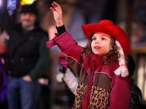 Emilie Menard waves to Santa at the 2012 Essex Santa Claus Parade on Talbot Street North Saturday, Dec. 8, 2012. (Windsor Star files)