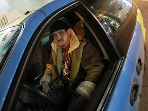 Taxi driver Frank Yousif waits in his cab outside Caesars Windsor in Windsor on Tuesday, Dec. 25, 2012. Despite the Christmas holiday many are hard at work.          (TYLER BROWNBRIDGE / The Windsor Star)