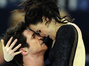 Canada's Tessa Virtue and Scott Moir perform Saturday during the free dance event at the ISU Grand Prix of Figure Skating Final in Sochi. (AFP photo)