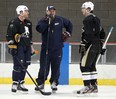 Oshawa Generals head coach D.J. Smith, centre,  talks with Sabres forward Steve Ott, left, and James Neal from the Pittsburgh Penguins during a practice at the WFCU Centre Friday. (JASON KRYK/The Windsor Star)