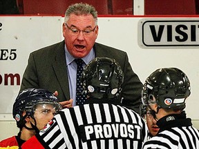 Kingsville Comets coach George Winter argues a call at Essex Arena in 2011. (NICK BRANCACCIO/The Windsor Star)